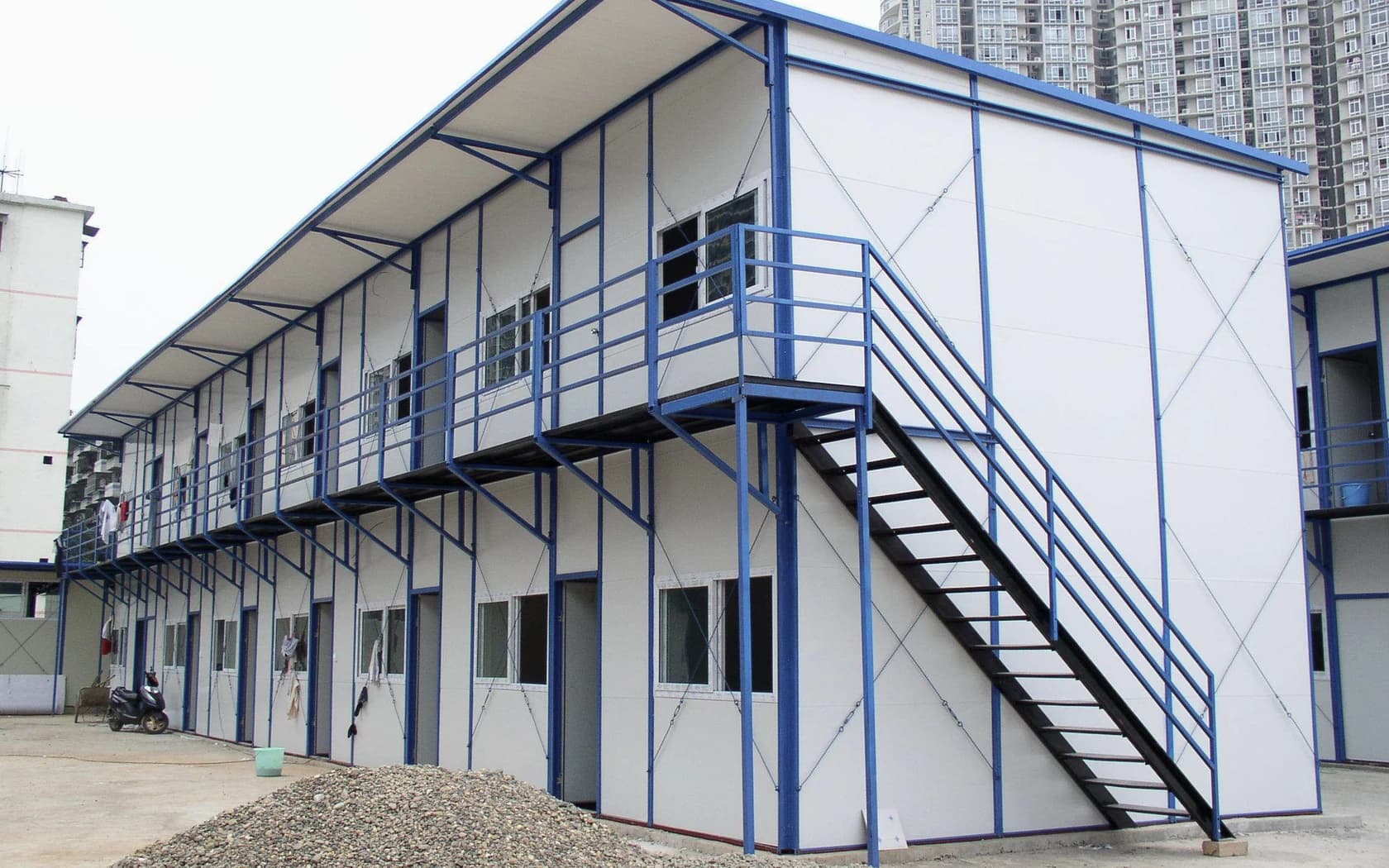 Customer-provided application reference showing light composite panels on modular support buildings